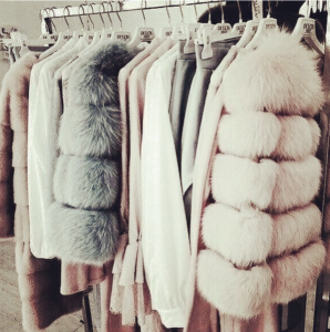 Wardrobe full of faux fur coats